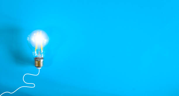 istock Creative thinking, ideas, innovation, business concept. Light bulb on blue background,negative space with free copy space. 2198325486