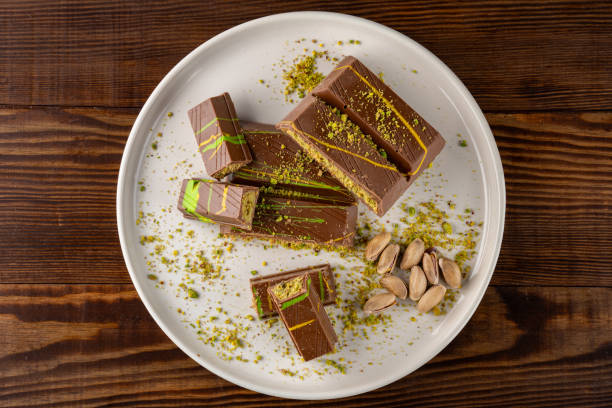 istock Chocolate bar filled with pistachio kunafa. Dubai chocolate 2198330532