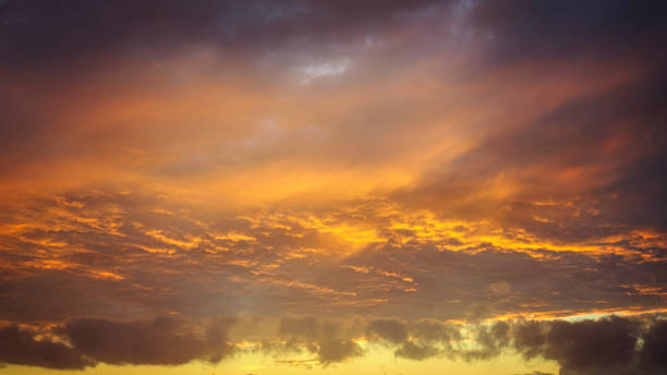 istock Dramatic red, orange, and yellow real fiery sky at sunset. Suitable for sky replacement, background or graphic design 2198332276