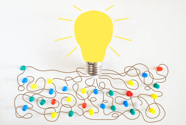 istock Creative thinking, ideas, innovation, business concept. Light bulb and pushpins with free copy space. 2198333019