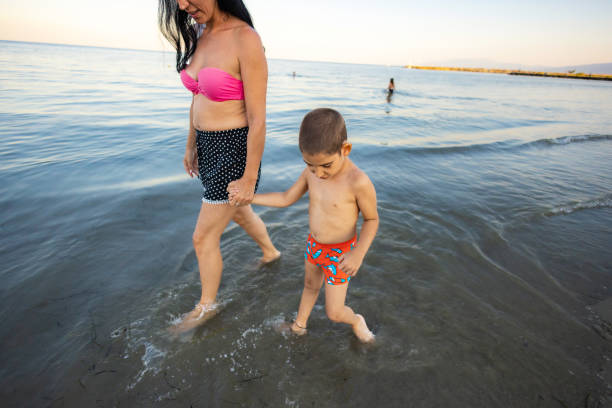 istock A Mother and Her Son Enjoying the Beach 2198335744