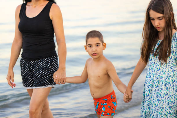 istock Mother, Sister, and Son Together 2198336726