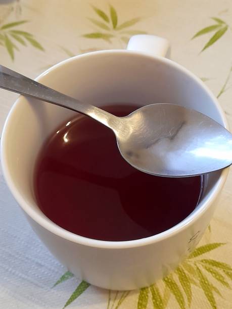 istock One mug of tea with spoon 2198337802