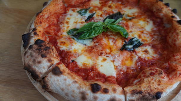 istock oven bake italian pizza with basil leaf 2198338116