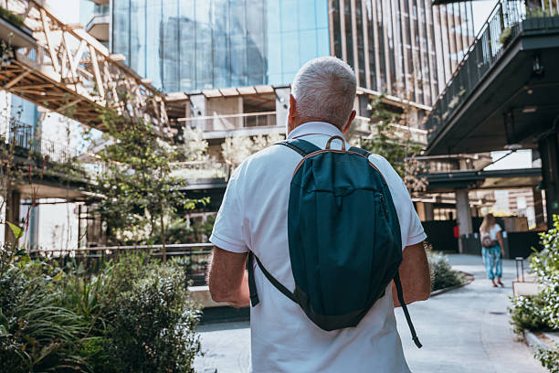 istock Senior Man Exploring Green Urban Architecture 2198340755