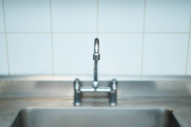 an old kitchen and its faucet