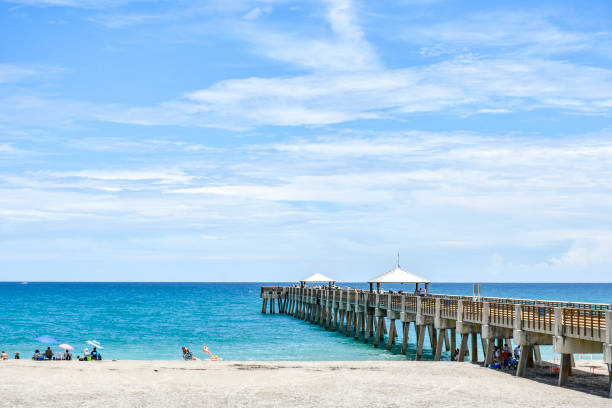 istock Gorgeous day overlooking Juno Beach pier in Palm Beach County, Florida. 2198343950