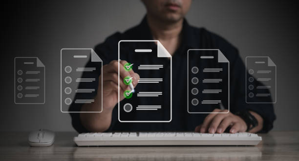 istock Digital Business Survey Checklist : Businessman using Stylus pen with laptop Evaluating Assessments Online , Surveys and Assessments , Maximizing Efficiency or Streamlining Success in the Digital Age 2198345115