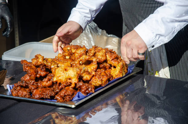 istock Preparing and serving food in a street kitchen 2198347030