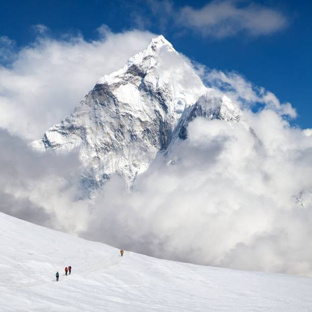 istock hikers on glacier and mount Ama Dablam 2198350078