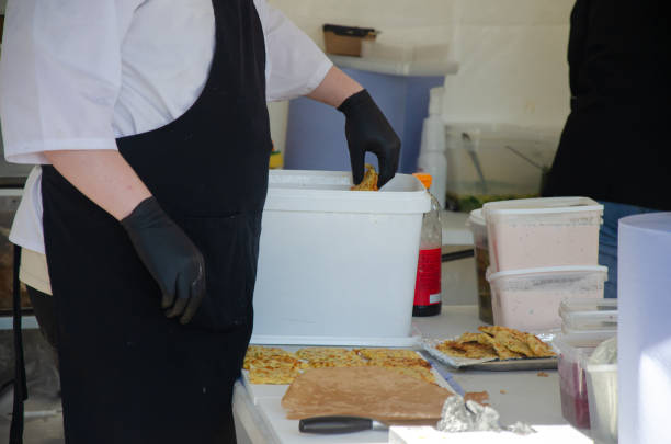 The process of cooking in an outdoor kitchen