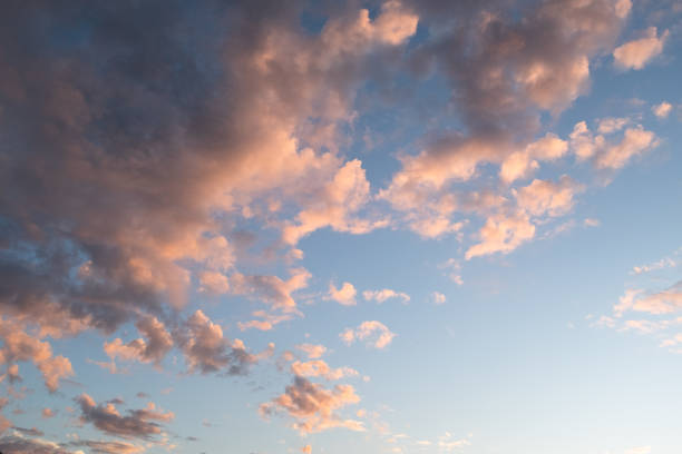 istock Golden Sunset Sky with Soft Clouds  Tranquil Evening Horizon, Dreamy Aesthetic, and Natural Beauty for Relaxing Atmospheres and Serene Visuals. High quality photography 2198355134