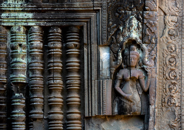 Siem Reap, Cambodia- February 2, 2014: Angkor Wat is a temple complex in the province of Siem Reap, Cambodia originally dedicated to the Hindu god Vishnu in the 12th century CE. It is among the largest religious buildings ever created. Its name means \