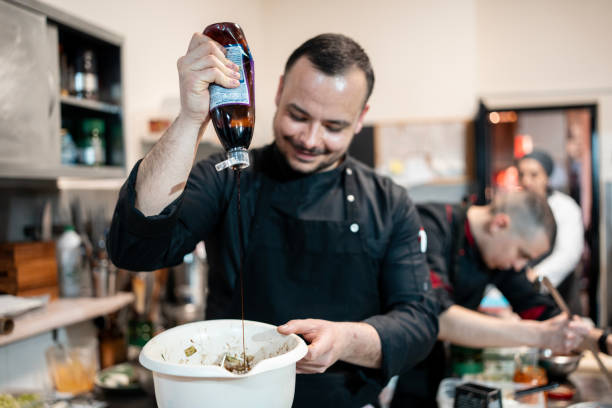 man in chef's uniform posing work professional. High quality photo