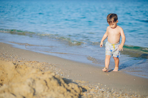Little boy enjoying the beach