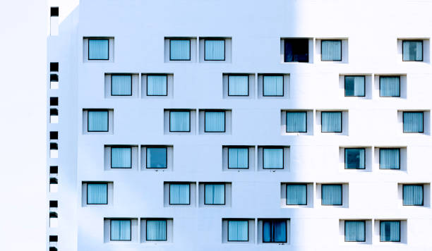 istock blue windows decorate the large white facade 2198357186