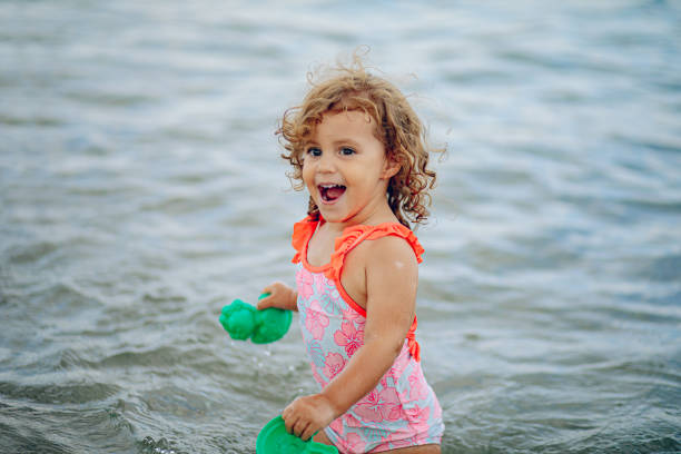 Little girl enjoying the beach