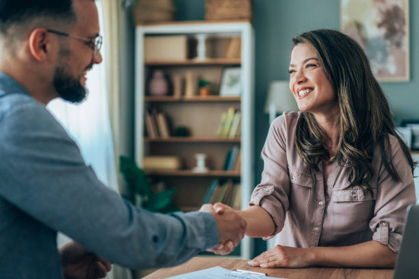 istock Successful Contract Signing Handshake in Modern Office 2198359249