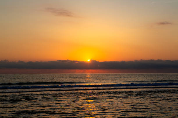 istock Sunrise over sea with glowing sky. 2198361224