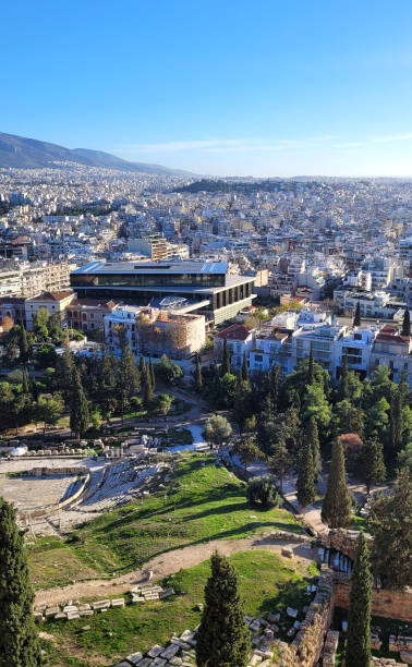 The photograph captures a panoramic view of Athens