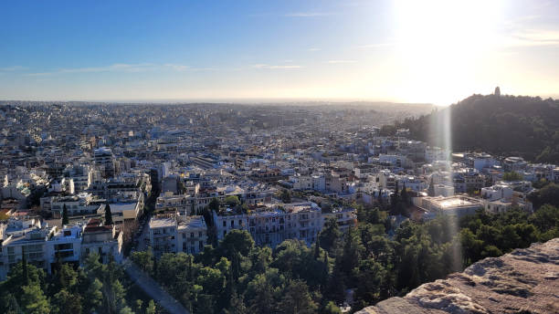 The photograph captures a panoramic view of Athens