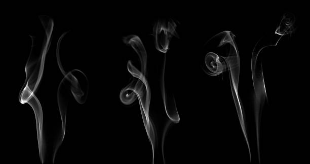 istock abstract white smoke or vapor floating on black background. Fog and cloud effect for air pollution design. Smog elements 2198367593