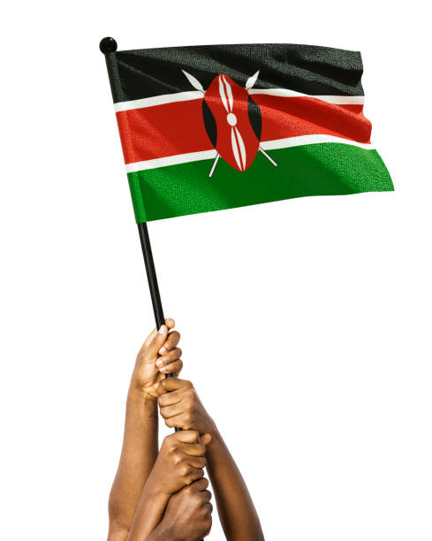 Many different group black African hands holding lifting raising kenyan national flag isolated over white background. Stretching arms for flag. Togetherness, unity independence day celebration