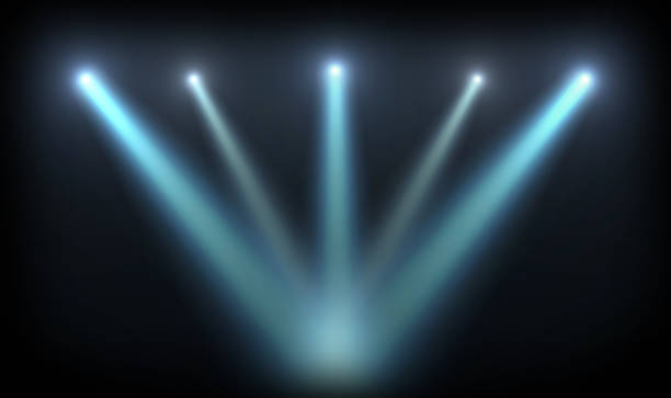 istock Spotlight on stage. Optical lens flares overlay shine effect on a black background. 2198371508