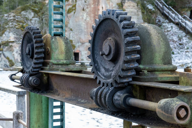 Old Mechanical Water Gate System. \nHistoric Hydropower Dam Machinery