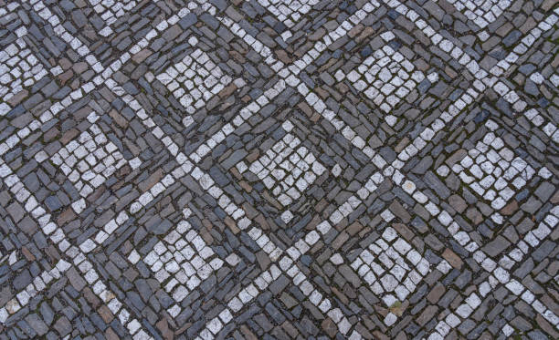 istock Cobblestone street with square shaped ornaments 2198375530