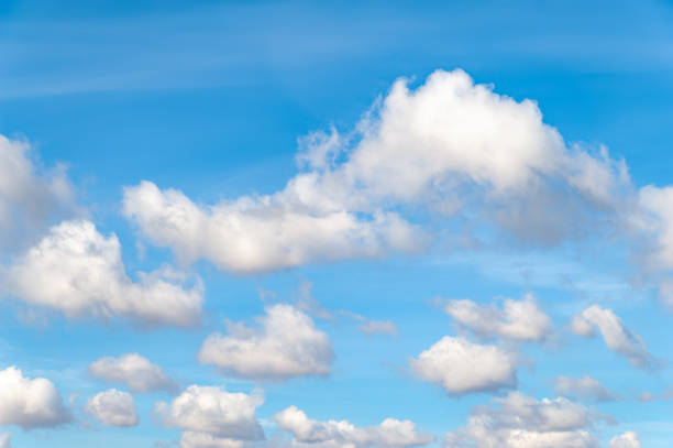 istock Cold clouds on a blue sky on an autumn day. 2198379759