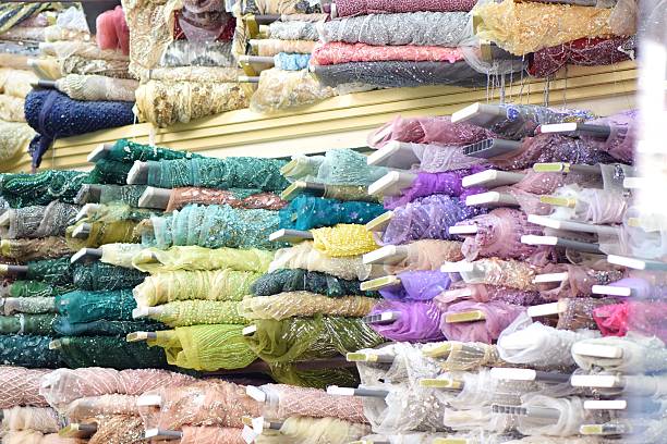 istock Rolls of luxury fabric with sequins and embroidery 2198383113