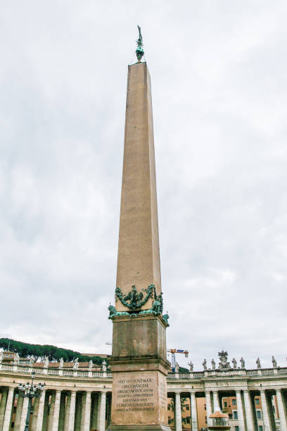 istock A tall building with a statue on top in Vatican 2198385882
