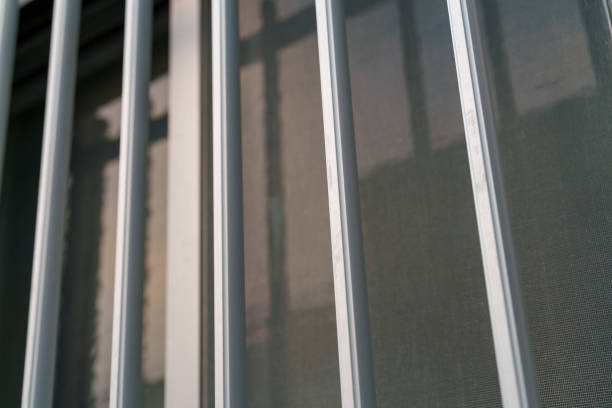 istock Building with glass windows and iron grilles 2198385959