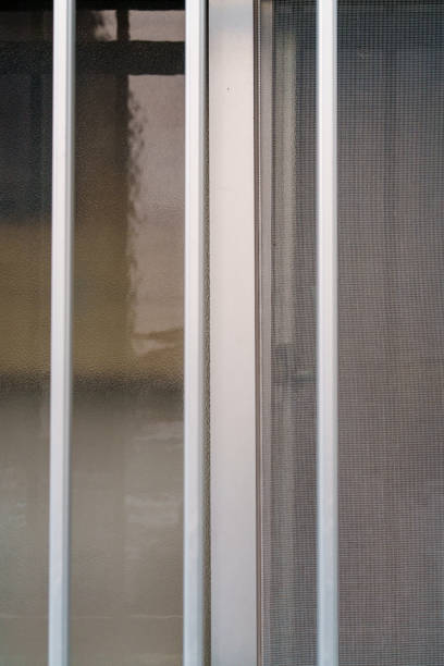 istock Building with glass windows and iron grilles 2198386011