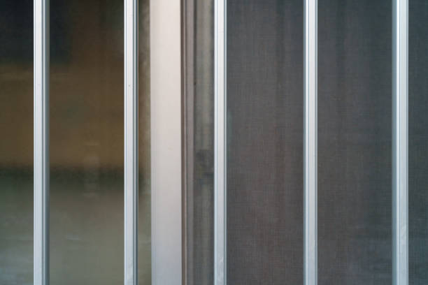 istock Building with glass windows and iron grilles 2198386024