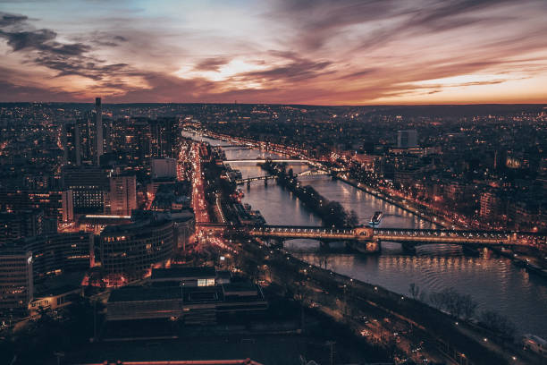 istock A Paris city at night with a river running through it 2198387173