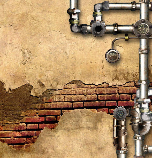 istock Vintage steampunk backdrop with pipes on stucco wall. Open space with brick wall and retro pipelines. Mock-up template. Grunge interior background. Copy space for text 2198389159