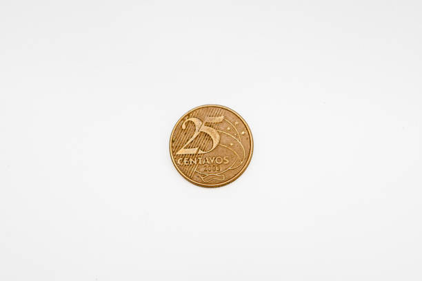 25 cents real coin on a white background in rio de janeiro, brazil.