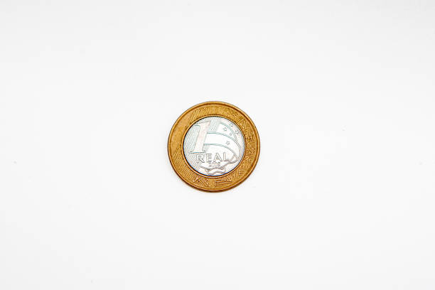 istock commemorative 1 real coin on a white background in rio de janeiro. 2198392659