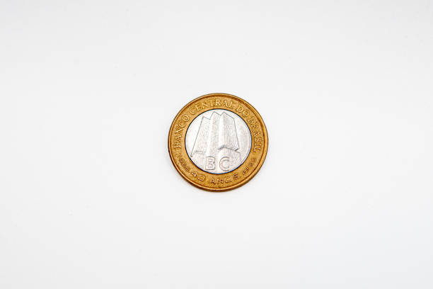 istock commemorative 1 real coin on a white background in rio de janeiro. 2198392738