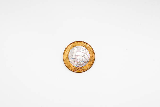 istock 1 real coin commemorating the olympics on a white background in rio de janeiro. 2198392857
