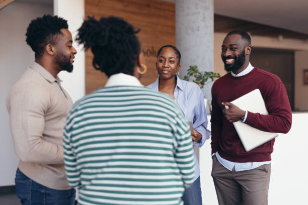 istock Diverse business team discussing a project in a modern office 2198393125