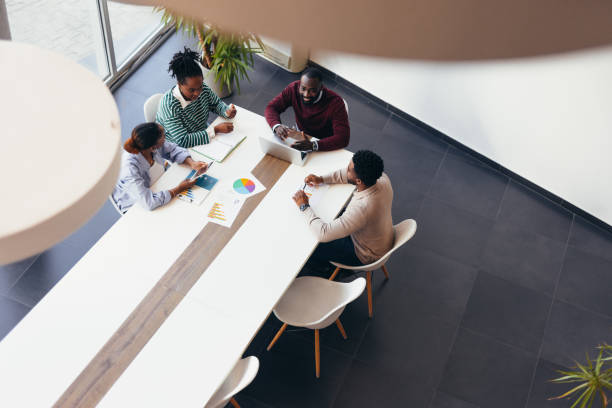istock Business team analyzing financial data during a meeting in the office 2198395331