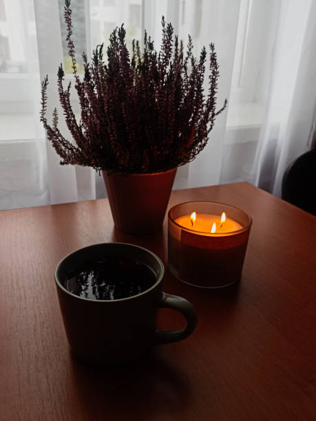 istock A cup of coffee and candle 2198397495