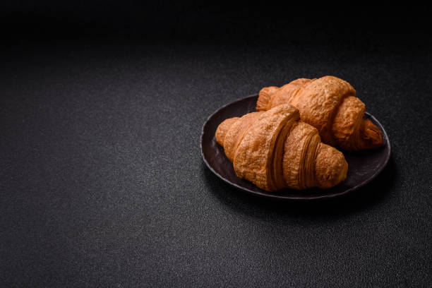 istock Sweet crispy croissants with chocolate filling 2198403555