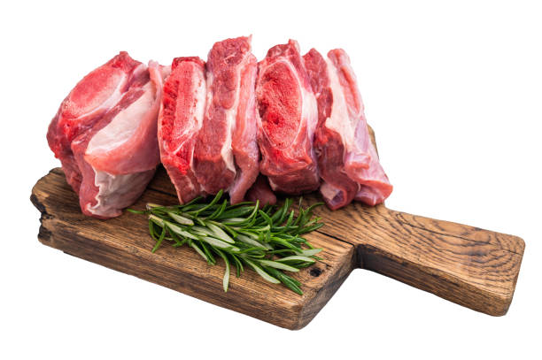 Raw beef Short chuck Ribs, fresh meat with bone on cutting board isolated on white background. top view.