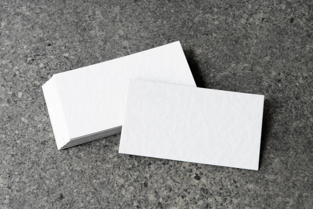 istock Business card on black background. 2198409163