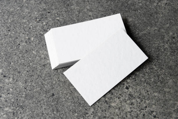 istock Business card on stone background. 2198409199