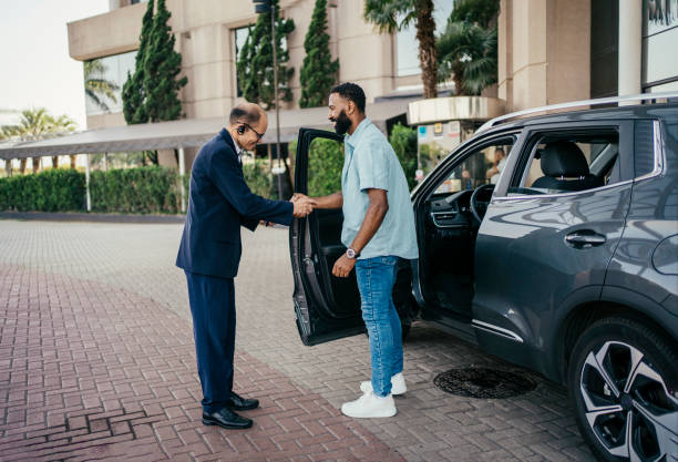 istock Guest arriving at hotel with car 2198412694